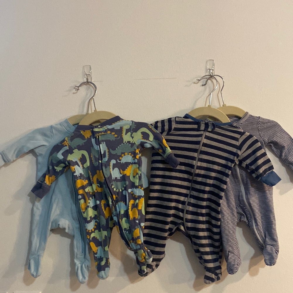 4 newborn onesie sleepers. Zipper.